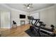 Workout room with mounted TV, treadmill, and stationary bike at 44421 Oriole Dr # 203, Indian Land, SC 29707