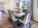 Bright dining room featuring a table set for six near a large window with backyard views at 4465 Dusty Orchard Rd, Kannapolis, NC 28081