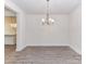 Spacious dining area with contemporary lighting fixtures at 5609 Morgan Mill Rd, Monroe, NC 28110