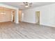Spacious living area with light wood floors, ample natural light, and a neutral color scheme at 5609 Morgan Mill Rd, Monroe, NC 28110