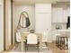 Cozy dining area with a modern table, white chairs, and a statement mirror at 5710 Olive Beach Rd, Kannapolis, NC 28081