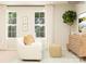 Cozy living room with comfortable seating, natural light, and stylish decor at 5710 Olive Beach Rd, Kannapolis, NC 28081