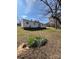 Spacious backyard featuring a well-maintained lawn and mature trees, perfect for outdoor activities at 5949 Flat Creek Rd, Kershaw, SC 29067