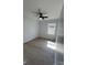 This bedroom features wood-look flooring, a ceiling fan, and one window at 5949 Flat Creek Rd, Kershaw, SC 29067