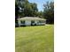 Charming one-story home featuring a well-manicured lawn and inviting curb appeal at 5949 Flat Creek Rd, Kershaw, SC 29067
