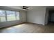 Bright living room with plenty of natural light, creating a warm and inviting atmosphere at 5949 Flat Creek Rd, Kershaw, SC 29067