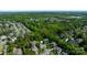 Beautiful home nestled among mature trees in a serene neighborhood at 653 Buckleigh Nw Ct, Concord, NC 28027