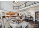 Spacious living room featuring dark hardwood floors, an open floor plan, and a staircase at 653 Buckleigh Nw Ct, Concord, NC 28027