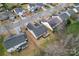 Charming neighborhood aerial view showcasing well-maintained homes and landscaping in a desirable location at 7047 Whittingham Dr, Indian Land, SC 29707
