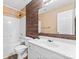 Clean bathroom showcasing a white vanity, a large mirror, and a shower-tub combination at 7047 Whittingham Dr, Indian Land, SC 29707