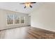 Vaulted ceiling primary bedroom featuring bright windows, ceiling fan, and light colored walls at 7047 Whittingham Dr, Indian Land, SC 29707