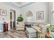 Comfortable living room features stylish furnishings, decor, and ample natural light at 7118 Overjoyed Xing, Charlotte, NC 28215