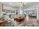 Open-concept living room seamlessly connected to the kitchen and other living spaces at 7118 Overjoyed Xing, Charlotte, NC 28215