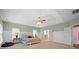 Bright and airy bedroom with trey ceiling, a large bed and many windows for ample natural light at 722 Fairway Point Dr, Fort Mill, SC 29708