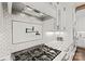 Gourmet kitchen with stainless steel appliances, gas range, tile backsplash and custom cabinets at 722 Fairway Point Dr, Fort Mill, SC 29708