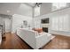 Beautiful living room featuring custom trim work, fireplace, and many windows with bright light at 722 Fairway Point Dr, Fort Mill, SC 29708