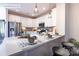 Contemporary kitchen with stainless steel appliances, white cabinetry, and a spacious countertop at 8117 Jacey Ln # 42, Huntersville, NC 28078