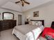 Bedroom featuring a large window, neutral colors, and two dark wood dressers at 8527 Conner Ridge Ln, Charlotte, NC 28269