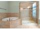 Modern bathroom with tiled shower and soaking tub at 917 Herrons Ferry Rd, Rock Hill, SC 29730