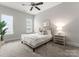 Serene bedroom with a soft rug, a comfy queen bed, and ample natural light from two windows at 917 Herrons Ferry Rd, Rock Hill, SC 29730