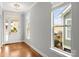 Bright foyer with hardwood floors, white trim, and natural light streaming through the windows at 917 Herrons Ferry Rd, Rock Hill, SC 29730