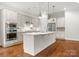 Modern kitchen featuring stainless steel appliances, a center island, and bright lighting, great for entertaining guests at 917 Herrons Ferry Rd, Rock Hill, SC 29730