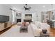 Spacious living room featuring a fireplace, hardwood floors, and ample seating. Perfect for entertaining at 917 Herrons Ferry Rd, Rock Hill, SC 29730
