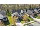 Aerial shot of the house with well maintained landscaping and mature trees at 10129 Loch Lomond Dr, Charlotte, NC 28278