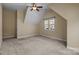Bedroom features neutral colors and natural light from a window at 10129 Loch Lomond Dr, Charlotte, NC 28278
