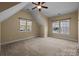 Bedroom features neutral colors and natural light from double windows at 10129 Loch Lomond Dr, Charlotte, NC 28278