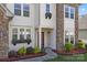 Inviting front entrance featuring stone accents, well-kept landscaping, and a neatly maintained walkway leading to the front door at 10129 Loch Lomond Dr, Charlotte, NC 28278