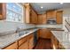 Kitchen with stainless steel appliances, granite countertops, and ample cabinet space at 10129 Loch Lomond Dr, Charlotte, NC 28278