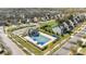 A high angle shot displays the neighborhood pool covered for the off season at 10129 Loch Lomond Dr, Charlotte, NC 28278