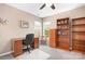 Bedroom with neutral walls, two windows letting in natural light, and built-in shelving at 105 Easy St, Mooresville, NC 28117
