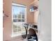 Functional laundry room with a washer, dryer, large window, and storage shelves at 105 Easy St, Mooresville, NC 28117