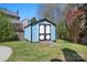Outdoor shed with double doors on grassy lot at 105 Easy St, Mooresville, NC 28117