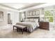 Spacious main bedroom suite with tray ceilings and ensuite bathroom at 1240 Cottage Green Dr # 0132, Monroe, NC 28112