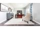 Well-lit home office with dark wood desk, neutral walls and decor, and modern furnishings at 1240 Cottage Green Dr # 0132, Monroe, NC 28112