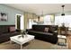 Open-concept living room and kitchen with modern decor, comfortable seating, and ample natural light at 1469 32Nd Sw St, Hickory, NC 28602