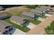 An aerial view of a collection of single Gathering homes with modern roof and lawn design at 1479 Southwest Blvd, Newton, NC 28658