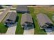 An aerial view of several single Gathering homes with gray roofs and green lawns at 1479 Southwest Blvd, Newton, NC 28658