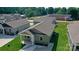 An aerial view of the single Gathering home with a green exterior and well-maintained lawn at 1479 Southwest Blvd, Newton, NC 28658