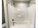 Bathroom shower and bathtub combo is made of white material with nickel hardware at 1479 Southwest Blvd, Newton, NC 28658
