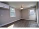 Bright dining room with sleek floors and a modern chandelier at 1479 Southwest Blvd, Newton, NC 28658