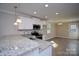 Well-lit kitchen showcasing stainless steel appliances and granite countertops at 1479 Southwest Blvd, Newton, NC 28658