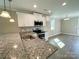 Kitchen with stainless steel appliances, granite countertops, and white cabinets at 1479 Southwest Blvd, Newton, NC 28658