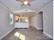 Open-concept living room with hardwood floors and abundant natural light at 1479 Southwest Blvd, Newton, NC 28658