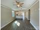 Open-concept living area with hardwood floors and lots of natural light at 1479 Southwest Blvd, Newton, NC 28658