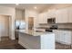 Modern kitchen featuring stainless steel appliances, granite countertops and white cabinets at 159 Wembury Ln, Troutman, NC 28166
