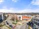 Aerial view of a town square including Chester Event Center and other vintage brick buildings on a clear blue sky day at 167 Saluda St, Chester, SC 29706